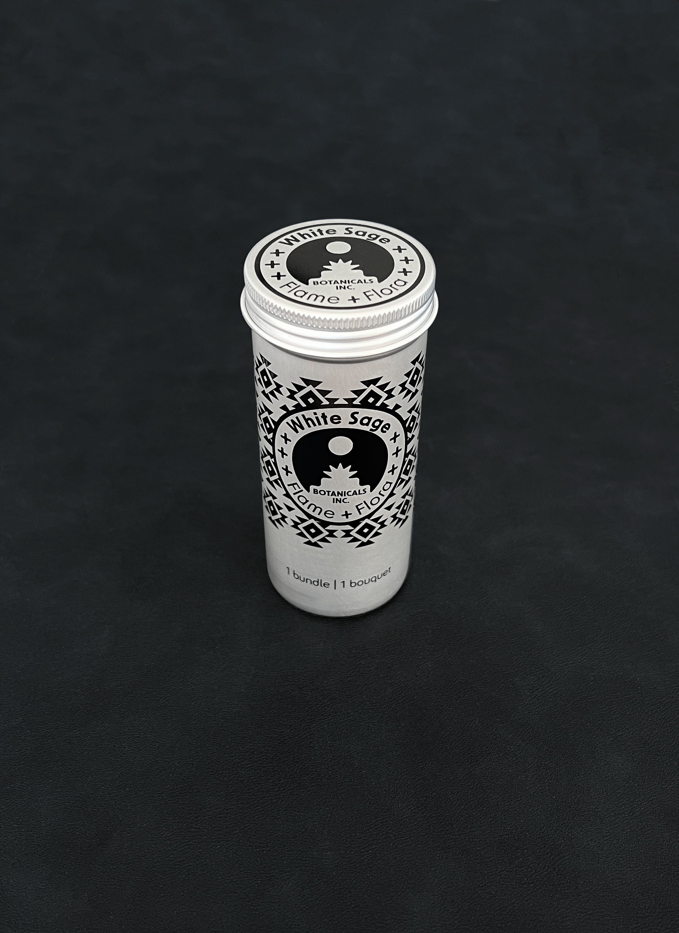 Silver metal storage tin with black patterned design for White Sage on a dark background